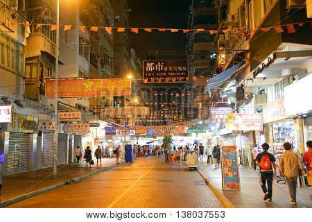 HONG KONG - NOV 9: Hong Kong Temple Street at night on Nov 9, 2015 in Kowloon, Hong Kong. Temple Street is famous for its night market and busiest flea markets at night in Hong Kong.