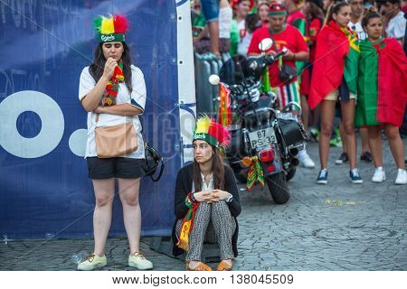 PORTO, PORTUGAL - JUL 10, 2016: Portuguese fans during video translation of the football match Portugal - France final of the European championship 2016, in Liberdade Square at city center of Porto. 