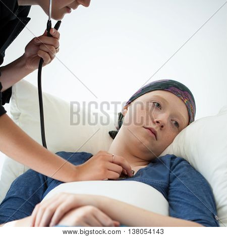 Doctor Examining Young Woman