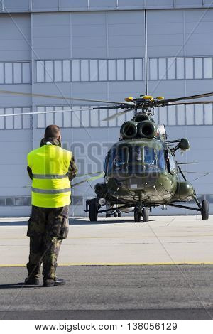 Ostrava, Czech Republic - September 22: Man In Military Uniform Stands In Front Of Polish Mi-8T Heli