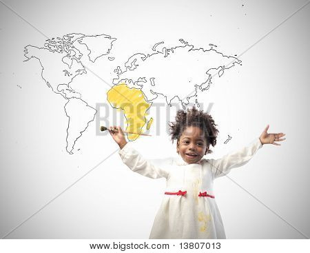 S úsměvem africké holčička s výkresem světa na pozadí