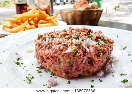 tasty Steak tartare (Raw beef) - classic steak tartare on white plate