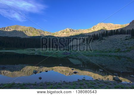 Wheeler Lake with mountain reflections in northern New Mexico.