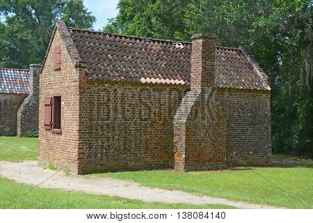 CHARLESTON SOUTH CAROLINA JUNE 28 2016: Slave cabins in Boone Hall Plantation in Mount Pleasant, the slave houses are insightful, and the Gullah Culture explanation is informative