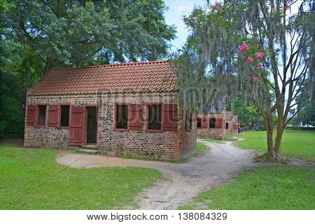 CHARLESTON SOUTH CAROLINA JUNE 28 2016: Slave cabins in Boone Hall Plantation in Mount Pleasant, the slave houses are insightful, and the Gullah Culture explanation is informative