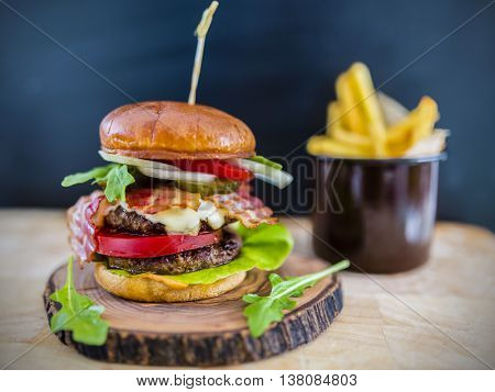 Tasty street food grilled double beef burger in crispy shortbread with lettuce and mayonnaise
