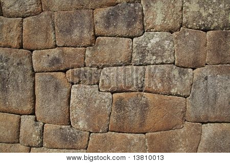 Inca väggen i staden Machu Picchu, Peru