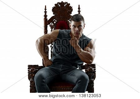 Ponderer muscular man on the throne. Isolated