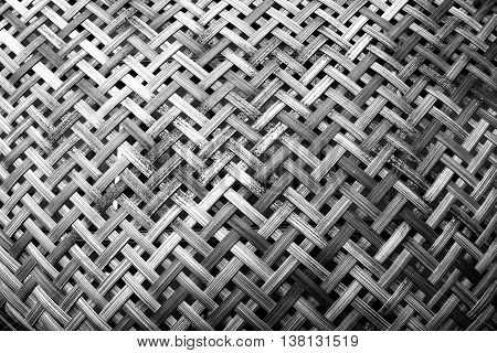 Wooden weave, basketwork twill weave, texture of bamboo wall background. Black and white tone.