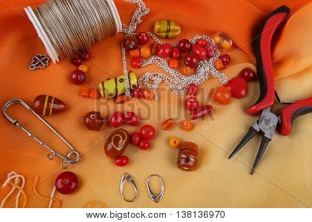 Bead jewelry making as a hobby. Crafting jewelry, wire, and tools.