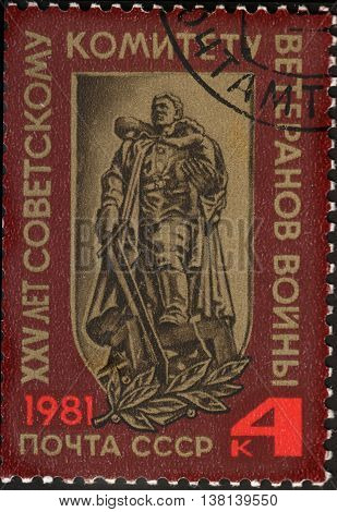 MOSCOW RUSSIA - DECEMBER 2015: a post stamp printed in the USSR shows a monument in the Treptow Park Berlin devoted to the 25th Anniversary of Soviet War Veterans Committee circa 1981