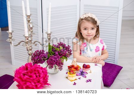 Little beautiful girl celebrate her fourth birthday