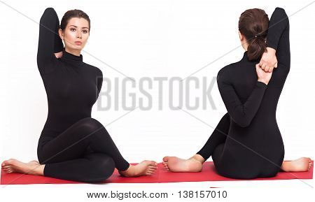 Beautiful athletic girl in a black suit doing yoga. gomukhasana asana - pose cow's head. Isolated on white background.