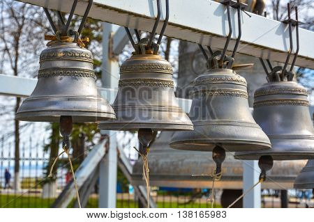 Group of bronze bells near the Orthodox church.