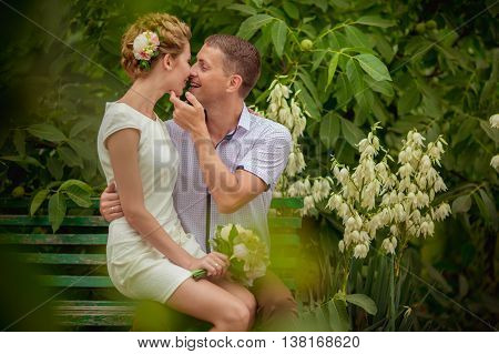 Bride and groom with flowers on their wedding day