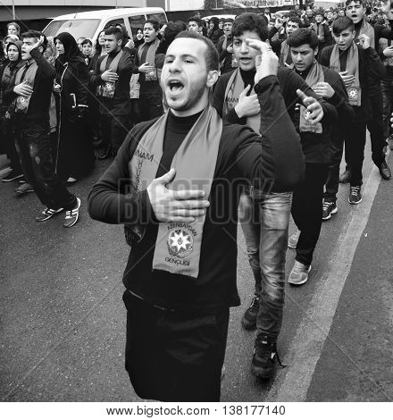 Istanbul Turkey - November 13 2013: The global mourning ceremony of Ashura. Azerbaijan Hz. Imam Hussain Group. Karbala Martyrs Commemoration in Arenamega. Thousands of Jaferies in Turkey joined the Karbala mourning ritual where Prophet Muhammad's grandson
