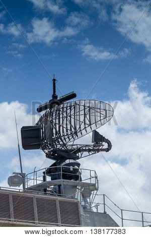 phased array surface detection and tracking radar early warning system mounted on gray frigate