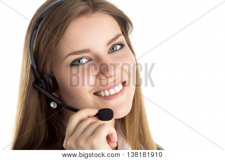 Portrait of young beautiful smiling call center worker talking to someone. Smiling customer support operator at work. Help and support or distant education concept. Isolated over white background