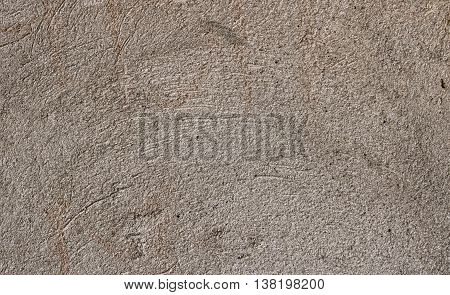 Old scratched outer wall decoration, warm gray color. texture