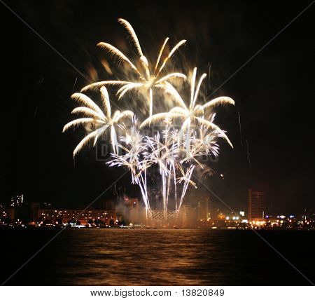 A collage of exploding fireworks