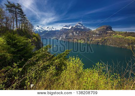 View to Swiss Alps and Lucerne lake from Sisikon village Switzerland