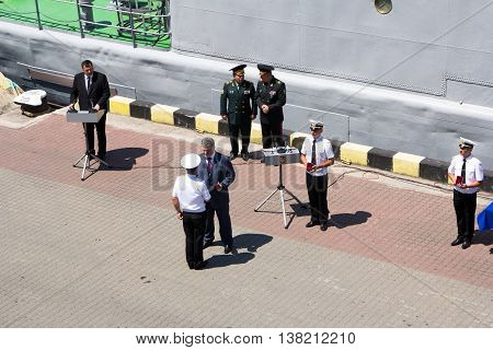 Odesa, Ukraine - July 03, 2016: President of Ukraine Petro Poroshenko awards sailors and soldiers on the pier of the Odessa port. Navy day celebration in Odesa