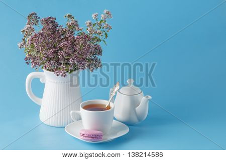Green Tea In Beautiful Cup With Oregano
