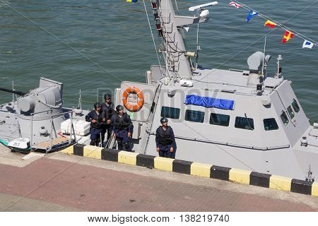 Odesa, Ukraine - July 03, 2016: sailors on the background of the new armored boats during the ship naming ceremony.