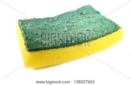 Used yellow sponge with dark green scrubber - isolated