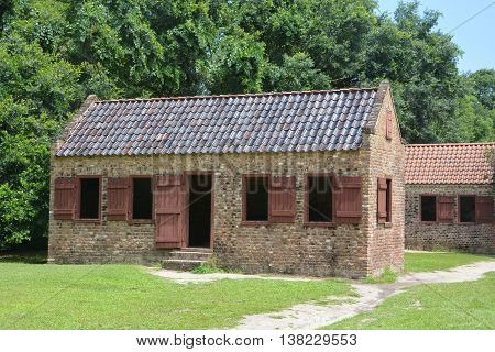 CHARLESTON SOUTH CAROLINA JUNE 28 2016: Slave cabins in Boone Hall Plantation in Mount Pleasant, the slave houses are insightful, and the Gullah Culture explanation is informative