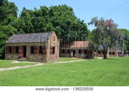 CHARLESTON SOUTH CAROLINA JUNE 28 2016: Slave cabins in Boone Hall Plantation in Mount Pleasant, the slave houses are insightful, and the Gullah Culture explanation is informative