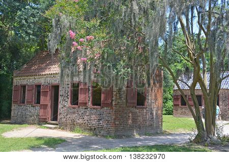 CHARLESTON SOUTH CAROLINA JUNE 28 2016: Slave cabins in Boone Hall Plantation in Mount Pleasant, the slave houses are insightful, and the Gullah Culture explanation is informative