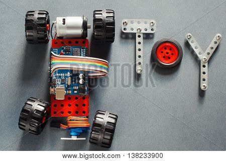 Educational diy toy for adults, electronics in life. Homemade electronic training plaything, made with microcontroller and simple parts of construction for kids.