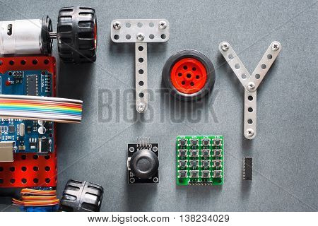 Educational construction, diy toys for adults and kids. Electronic machine made on microcontroller base for studying and fun. Joyful training tool