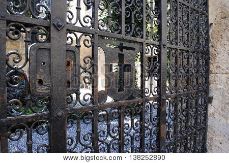 the old wrought-iron gate with rust in the fortress of Rhodes
