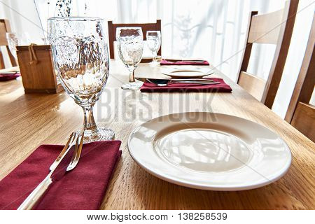 The serving dinner table in a restaurant