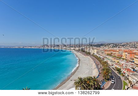 View of the beach and esplanade in Nice France from Bellanda Tower of Castle Hill. Nice (Nicaea) was probably founded around 350 BC by the Greeks of Massilia