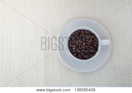 Coffee Beans In A Cup.