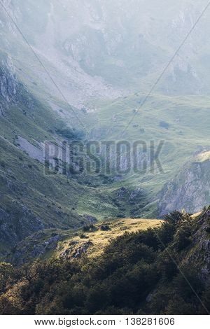 Sunbeam on cliff in mountain, Dinaric Alps, Europe.