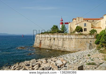 Ajaccio France - May 27 2016: the lighthouse of the citadel overlooking the bay in the center of capital city of Corsica and birthplace of Napoleon Bonaparte