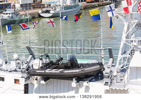 Odesa, Ukraine - July 03, 2016: Dinghy for the purposes of landing and patrol. The inscription on the boat 'sea guard'. Celebration of Ukrainian NAVY forces day