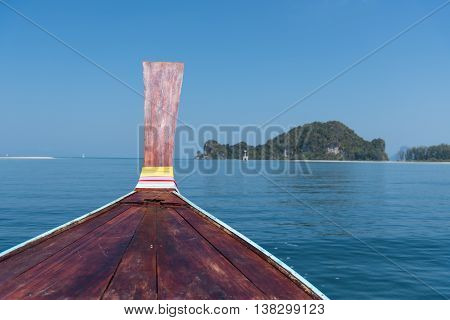 Thai Wooden Head Longtail Boat Heads Toward
