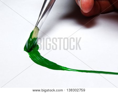 drawing in watercolor or acrylic paint brush on paper