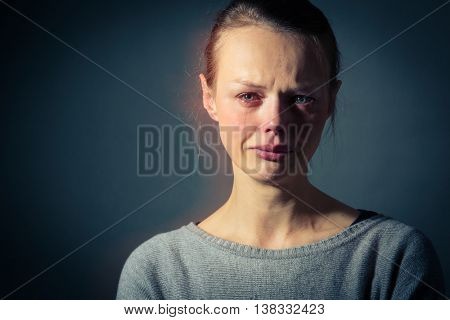 Young woman suffering from severe depression/anxiety/sadness