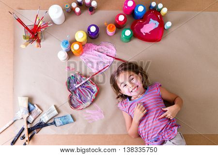 Happy Little Girl Artist With Her Art Supplies
