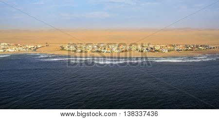 Aerial view on the coast in Namibia and modern districrt of the city Walvis Bay in the Namib desert Atlantic ocean Africa
