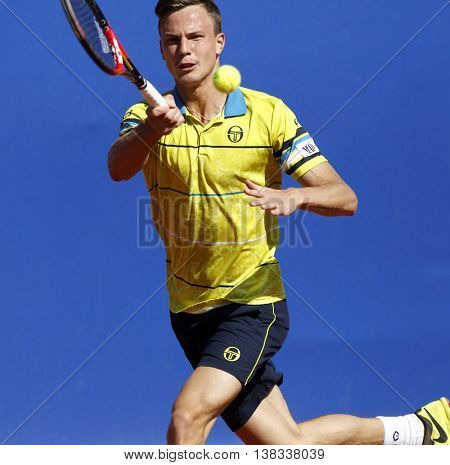 BARCELONA - APRIL,19: Hungarian tennis player Marton Fucsovics in action during a match of Barcelona tennis tournament Conde de Godo on April 19, 2016 in Barcelona