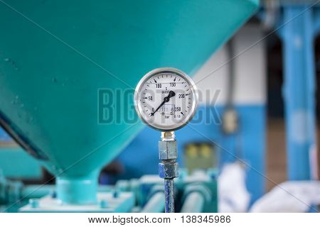 cloack face on molding machine with blurred background