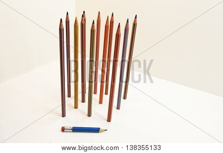 Colored pencils located vertically. Isolated on white background.