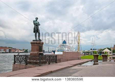 SAINT - PETERSBURG, RUSSIA - JULY 13, 2016: Vasilyevsky Island. Ivan Krusenstern (Russian admiral and explorer) Sculpture on Lieutenant Schmidt Embankment next to The Neva River